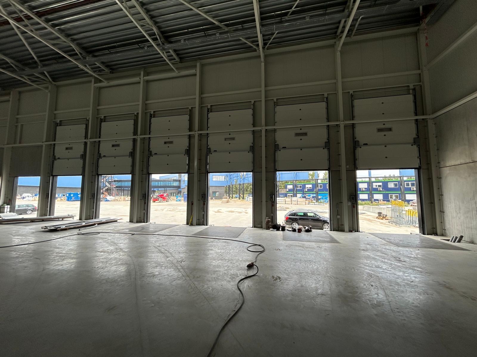 Battery of sectional doors