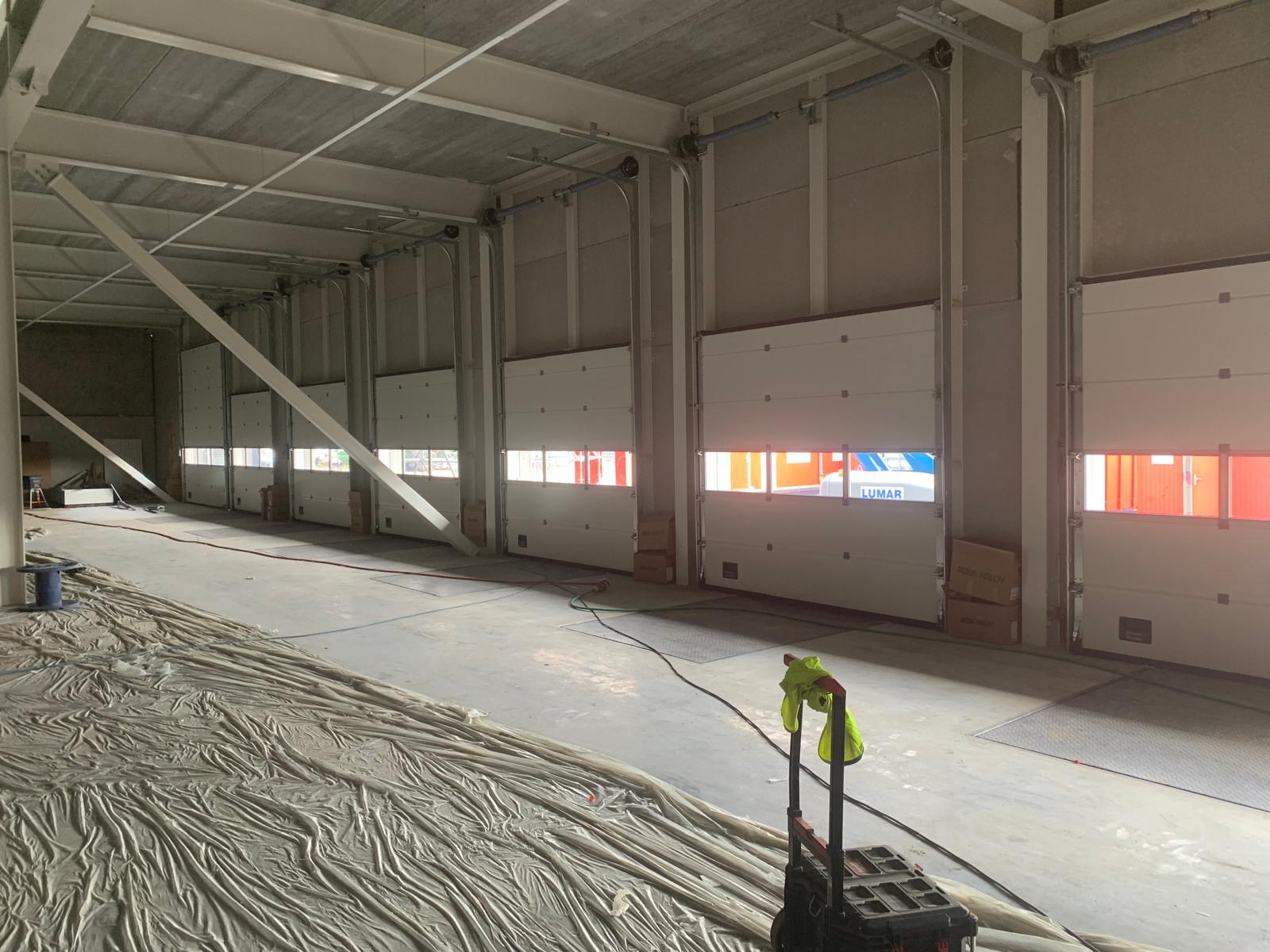Loading docks with sectional doors