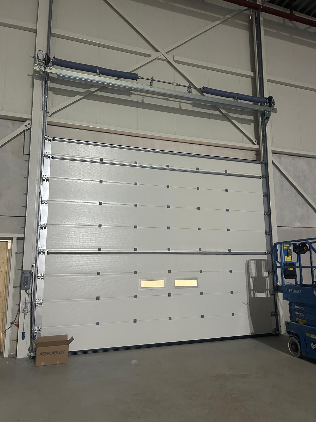 Sectional door entrance installation